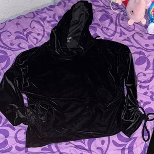 A two piece black velour set only worn twice